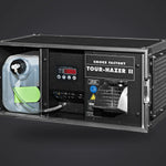Smoke Factory Tour Hazer II hazer in its road case, lid open: fluid tank, control display and output nozzle