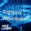 Stunning blue laser beams scanning across a captivated audience, with the Nice Lasers logo in the corner, showcasing the visually impressive Anthony Workspace laser cue collection.